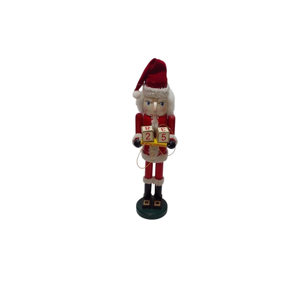 Vintage wooden santa clause nutcracker with christmas countdown calender.